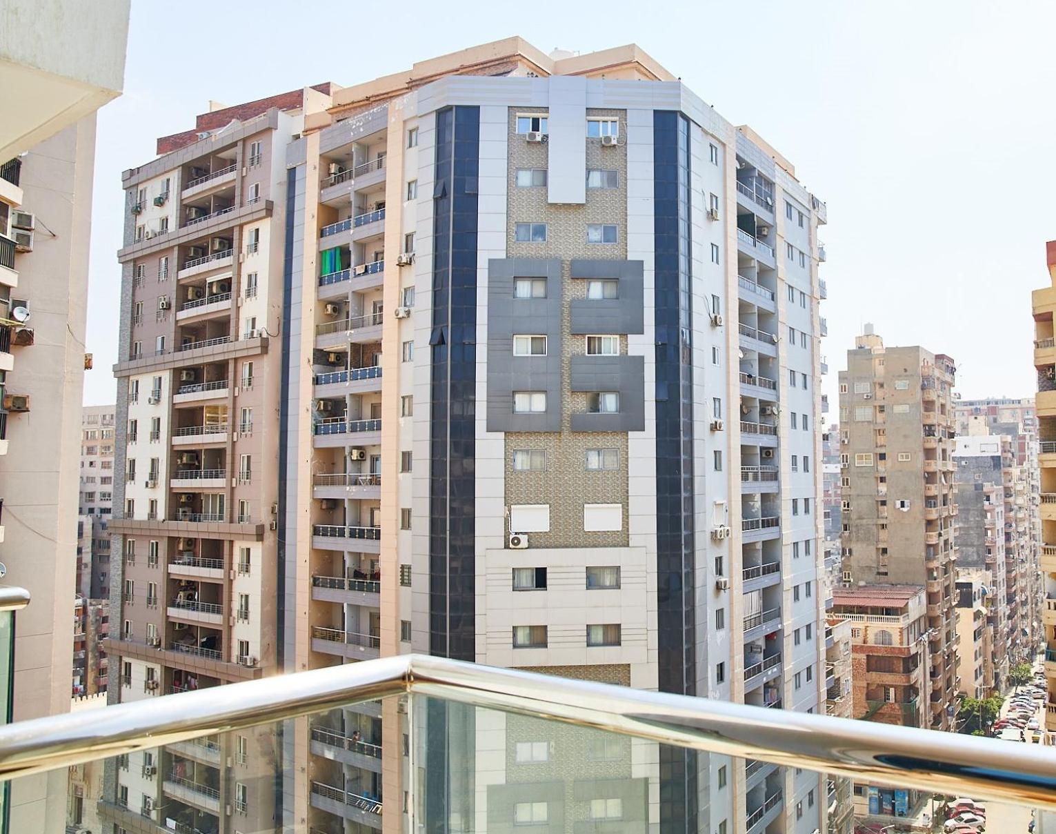 Hilton Alexandria Corniche Hotel Exteriör bild Residential buildings in Nasr City